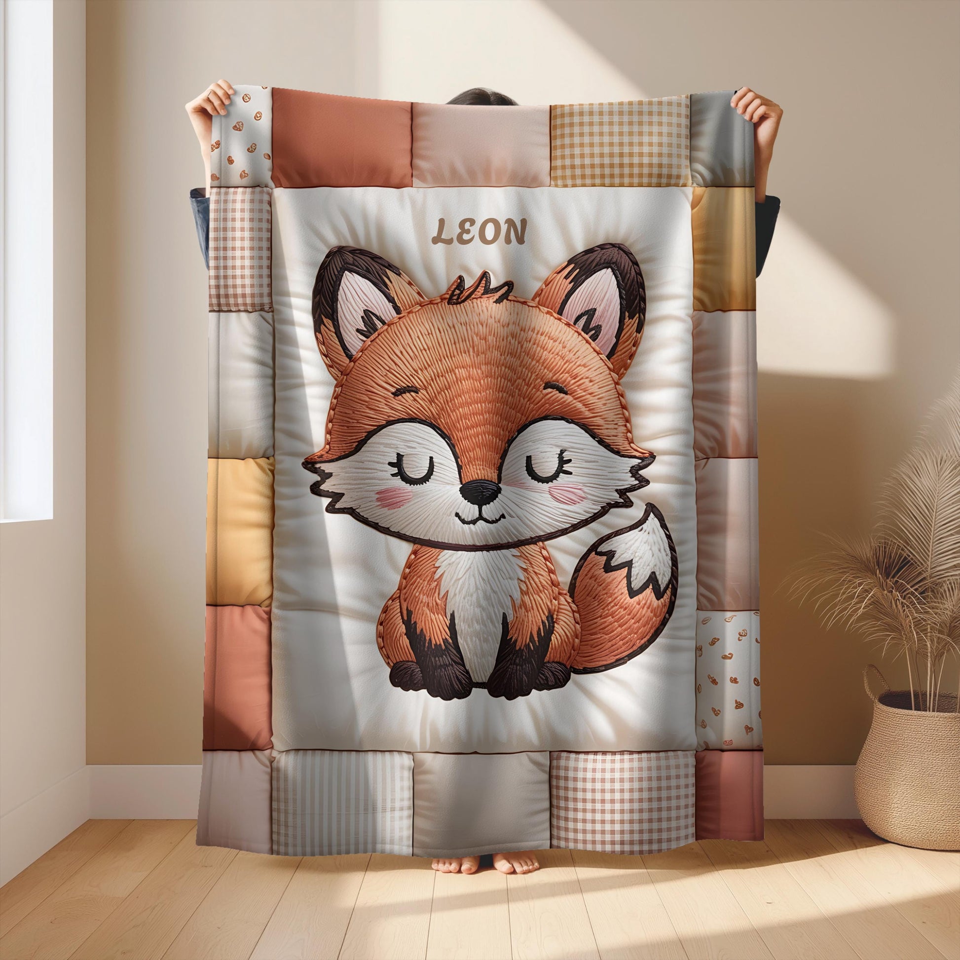 A timeless heirloom-style baby quilt featuring a woodland fox in an embroidered-look patchwork design. Soft neutral tones, perfect for nursery decor or a newborn gift.