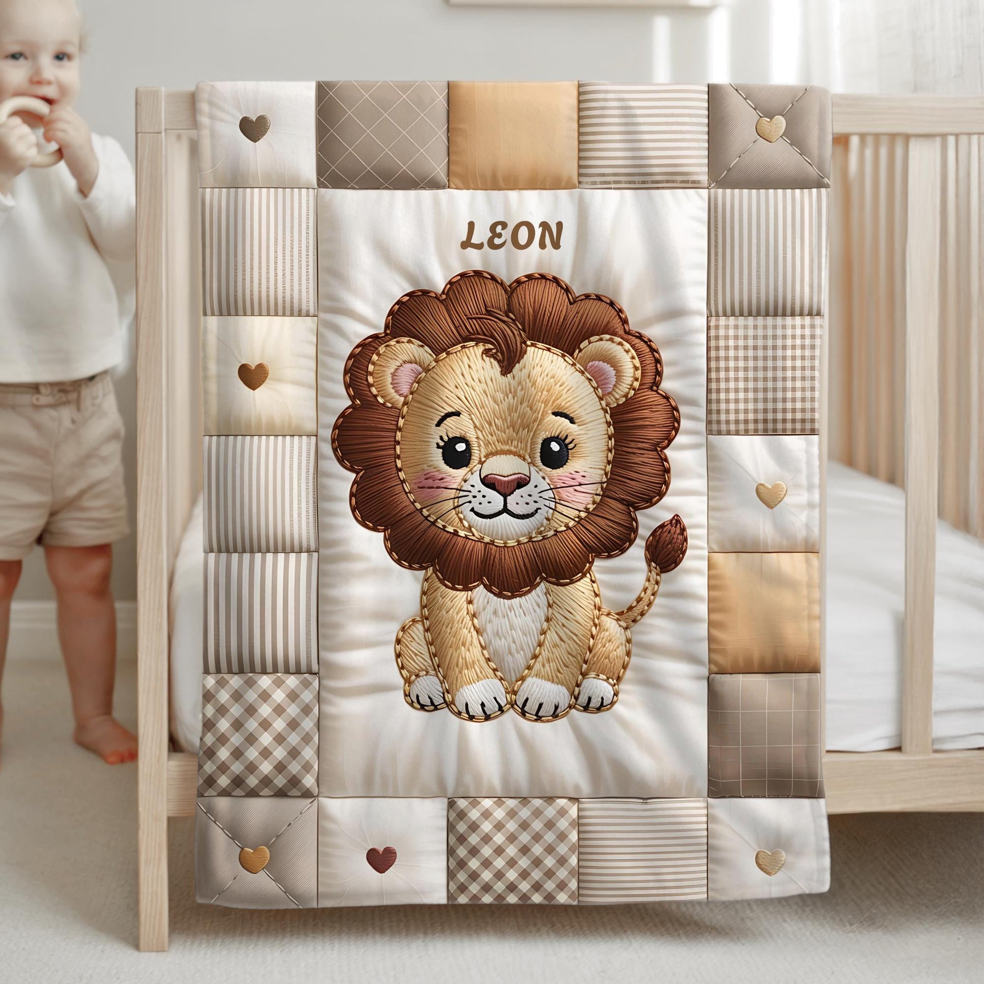 A personalized baby quilt blanket featuring a sweet lion in an heirloom-style patchwork look. Soft neutral tones – perfect for safari or neutral nurseries.