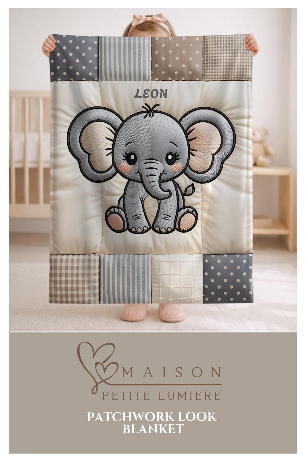 A personalized baby quilt blanket featuring a sweet elephant in an embroidered-look patchwork design. Soft neutral tones, perfect for nursery decor or a newborn gift.