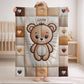 A personalized baby quilt blanket featuring a sweet teddy bear in an embroidered-look patchwork design. Soft neutral tones, perfect for nursery decor or a newborn gift.