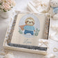 Personalized woven cotton baby blanket featuring a cute superhero sloth. Embroidered-look design, custom name, timeless nursery decor.