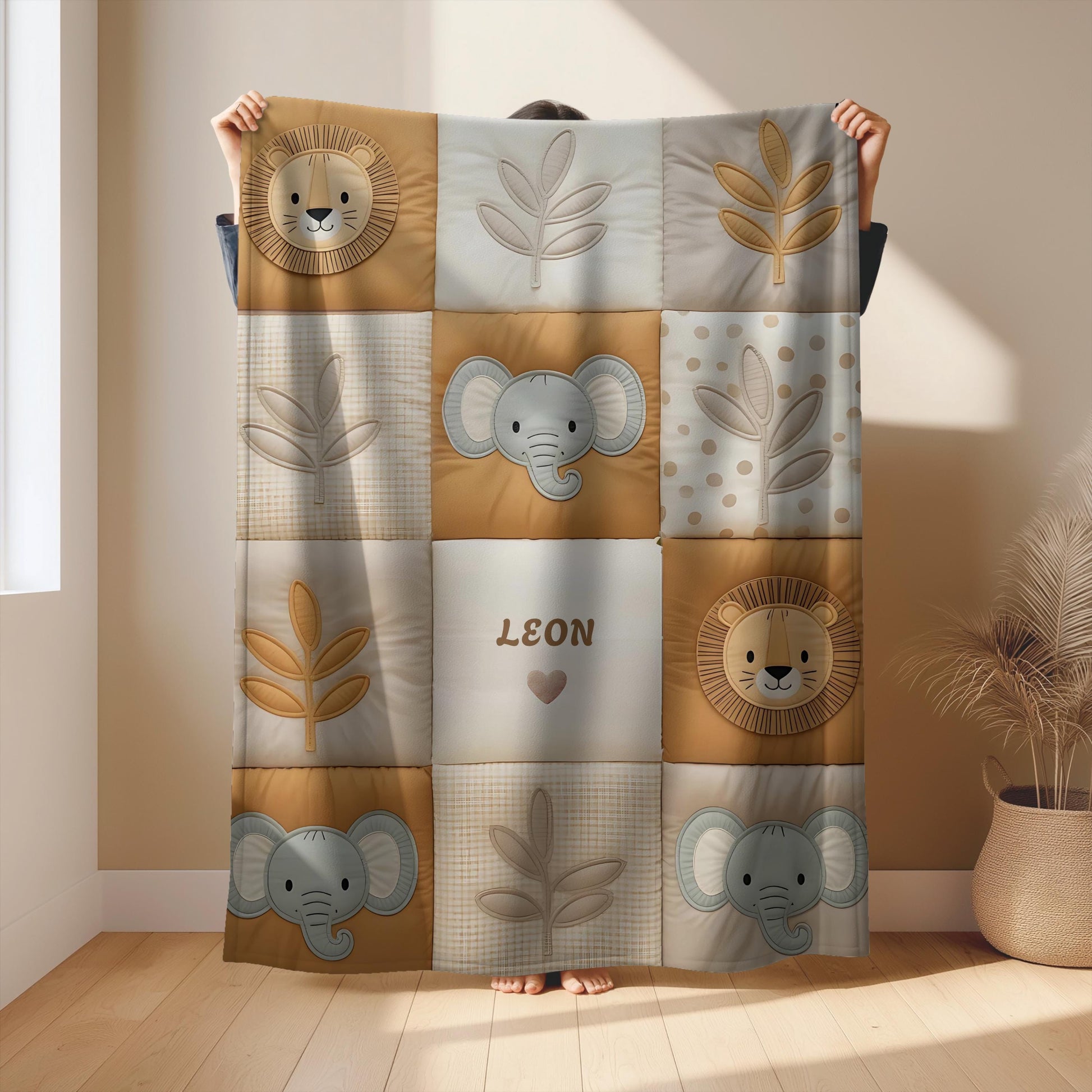 Personalized patchwork look baby blanket with name, lion and elephant in a soft safari quilt design. Cozy newborn blanket and baby gift.
