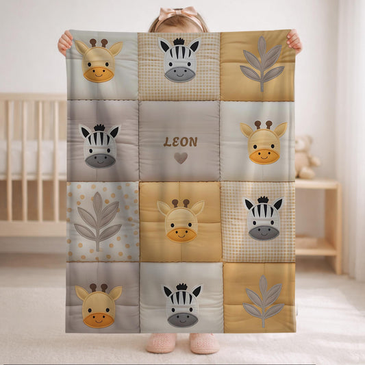 Personalized patchwork look baby blanket with name, giraffe and zebra in a soft safari quilt design. Cozy newborn blanket and thoughtful baby gift.