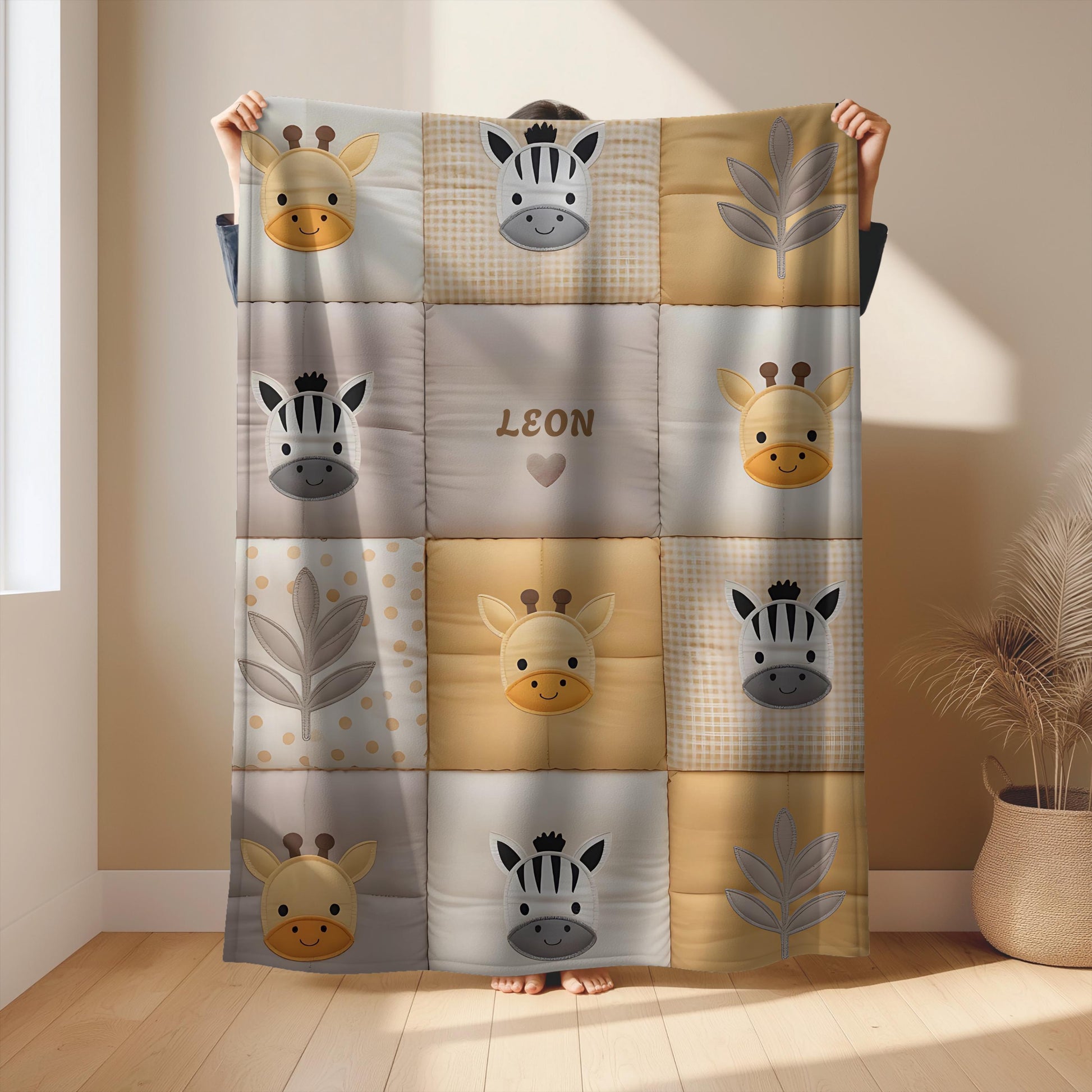 Personalized patchwork look baby blanket with name, giraffe and zebra in a soft safari quilt design. Cozy newborn blanket and thoughtful baby gift.