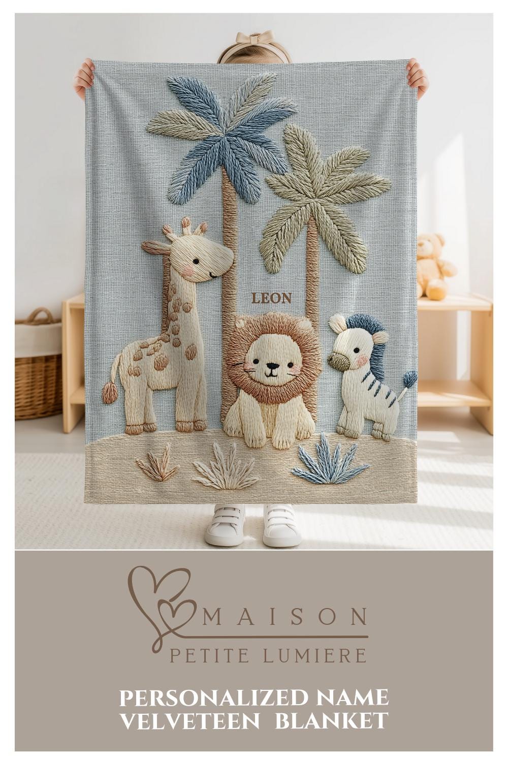 Personalized safari baby blanket with name featuring calm animal embroidered-look design in neutral tones. Timeless nursery decor and a thoughtful newborn gift.