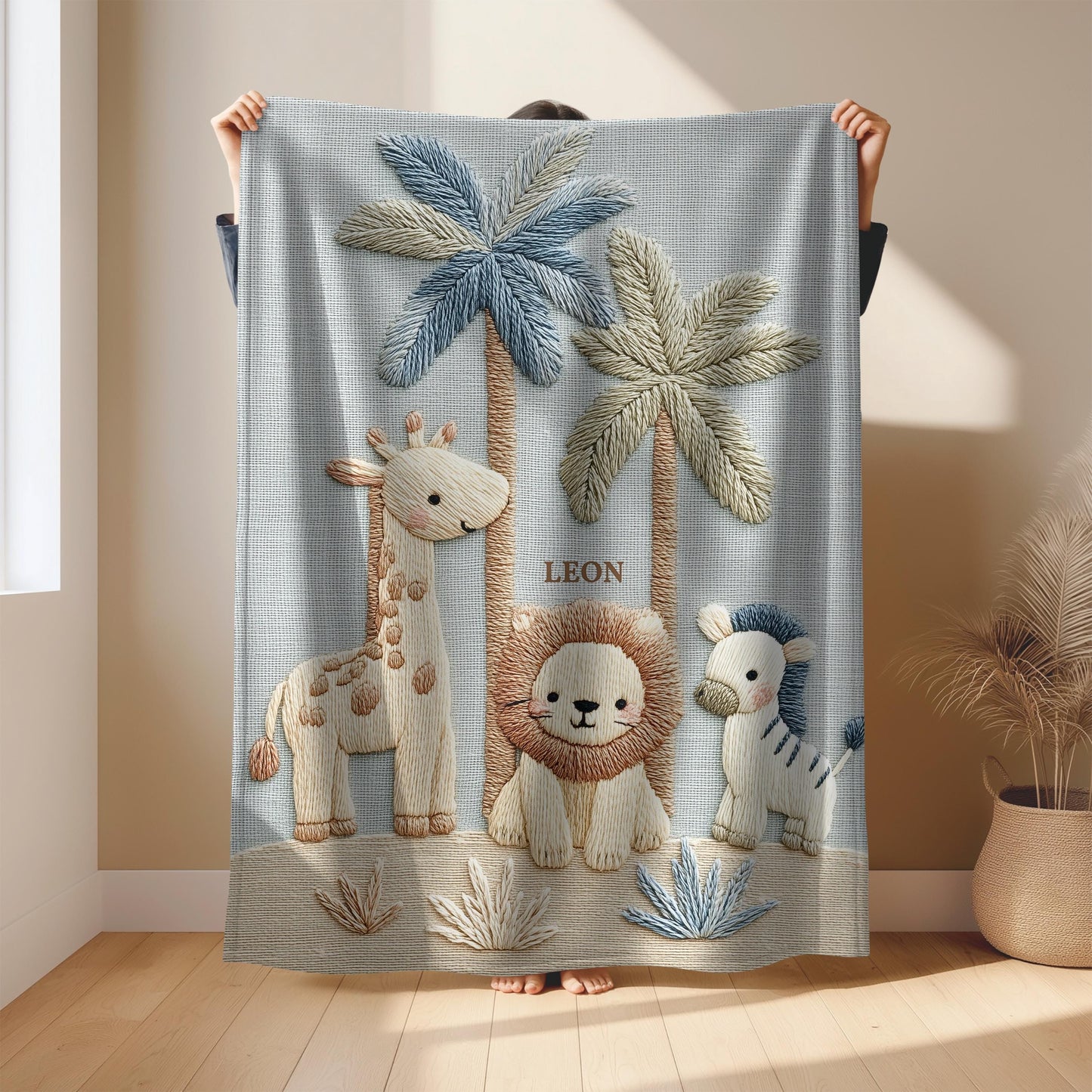Personalized safari baby blanket with name featuring calm animal embroidered-look design in neutral tones. Timeless nursery decor and a thoughtful newborn gift.