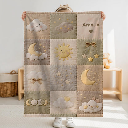 Personalized patchwork look baby blanket with clouds, sun, moon and stars in a soft quilt-style design. Neutral nursery colors with custom name.