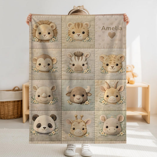 Personalized velveteen baby blanket with a quilt-inspired patchwork of soft safari animals. A cozy, timeless newborn or baby shower.