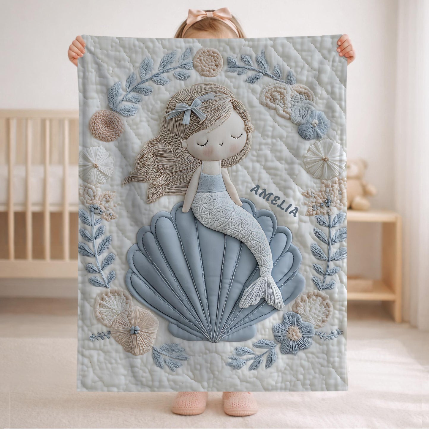Soft embroidered-look mermaid baby blanket with a calm mermaid seashell design and pastel florals. Neutral tones, cozy fabric — a boutique newborn gift for serene, modern nursery decor.