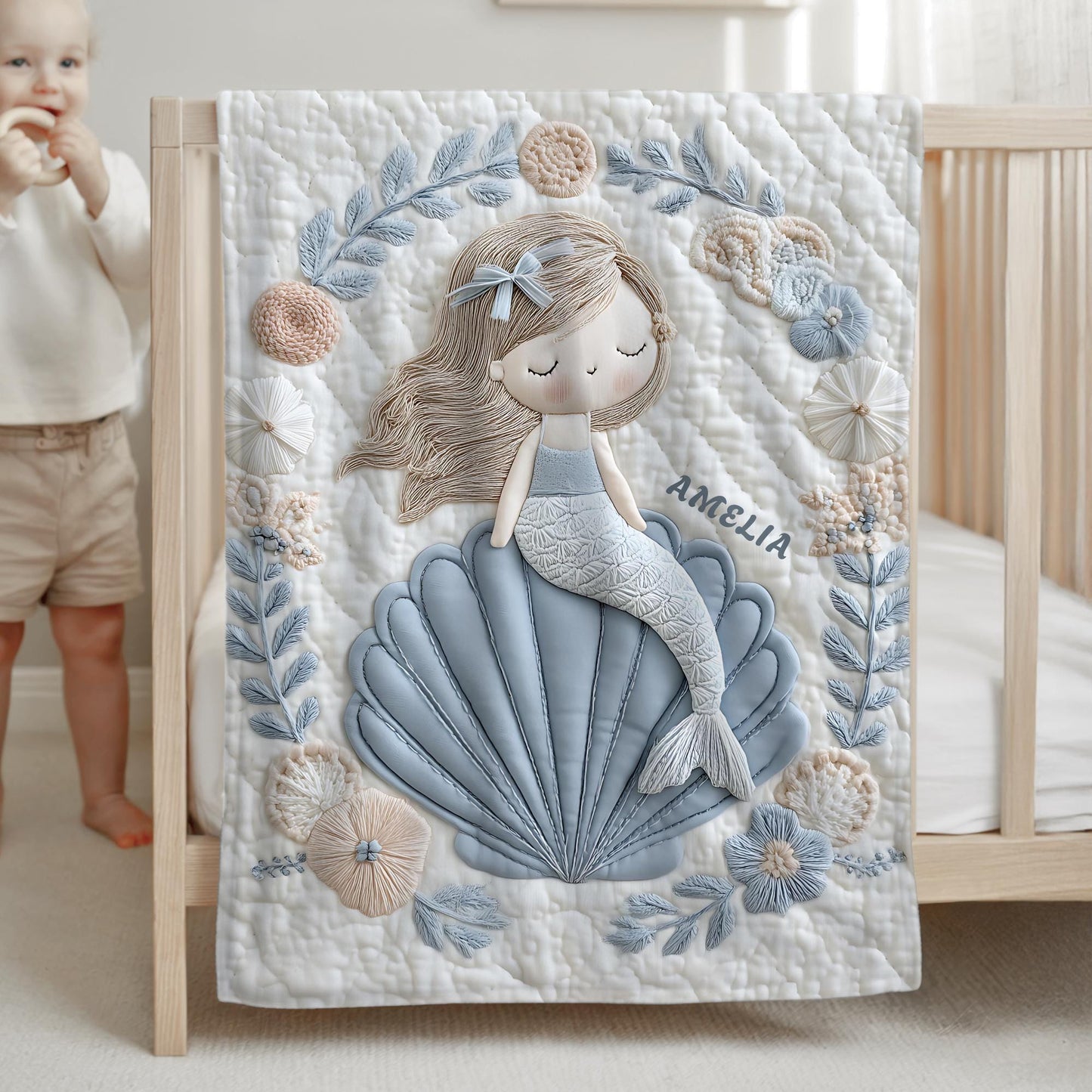 Soft embroidered-look mermaid baby blanket with a calm mermaid seashell design and pastel florals. Neutral tones, cozy fabric — a boutique newborn gift for serene, modern nursery decor.