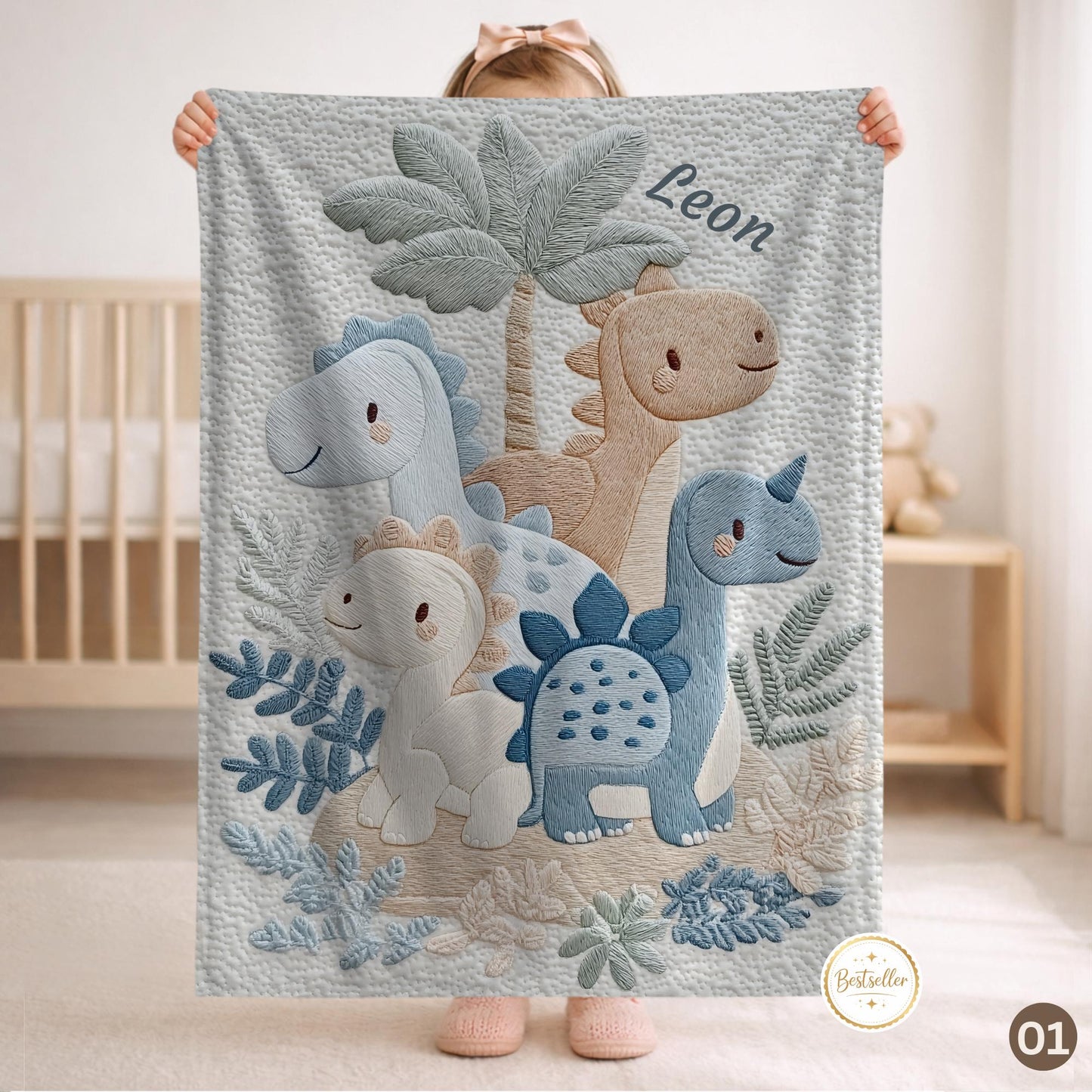 Personalized Dinosaur baby blanket with name - embroidered look details in soft neutral colors. A cozy newborn blanket and timeless boutique baby gift.