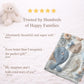Soft embroidered-look baby blanket featuring a calm fish motif with delicate floral details. Gentle neutral and pastel tones — a timeless boutique-style gift for modern, serene nurseries.