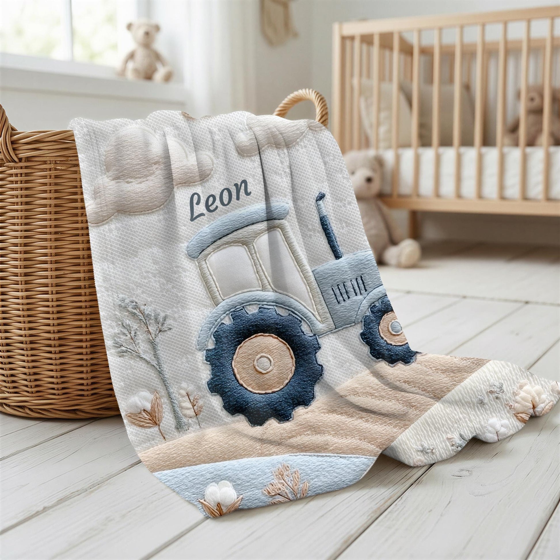Personalized Traktor baby blanket with name - embroidered look details in soft neutral colors. A cozy newborn blanket and timeless boutique baby gift.