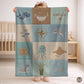 Personalized patchwork look baby blanket with name, crab, whale and octopus in a soft underwater quilt design. Cozy newborn blanket and baby gift.