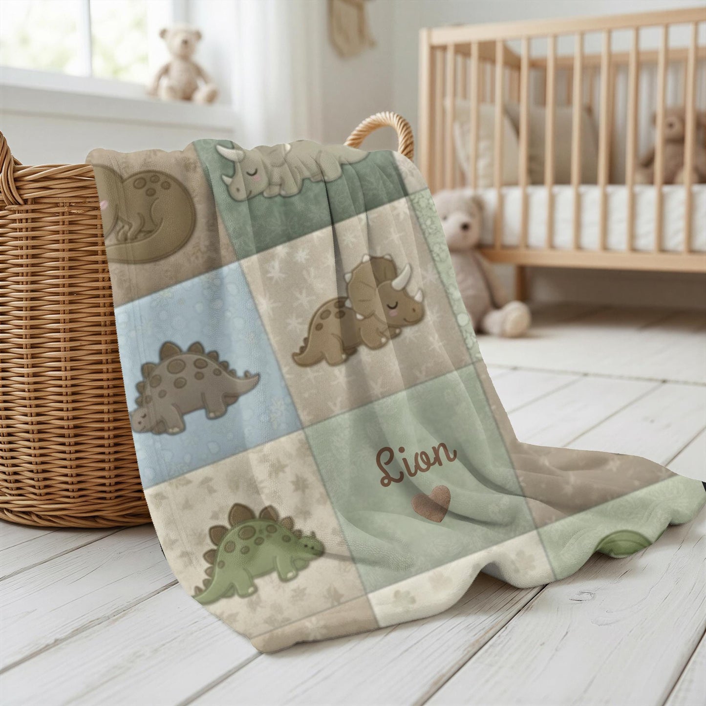 Personalized patchwork look baby blanket with cute dinosaurs in a soft quilt-style design. Neutral nursery colors with custom name panel.