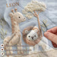 Personalized Safari baby blanket with name - embroidered look details in soft neutral colors. A cozy newborn blanket and timeless boutique baby gift.