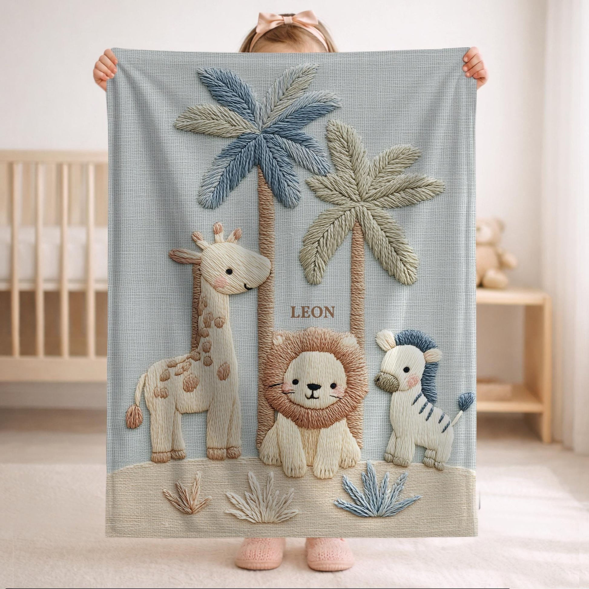 Personalized Safari baby blanket with name - embroidered look details in soft neutral colors. A cozy newborn blanket and timeless boutique baby gift.
