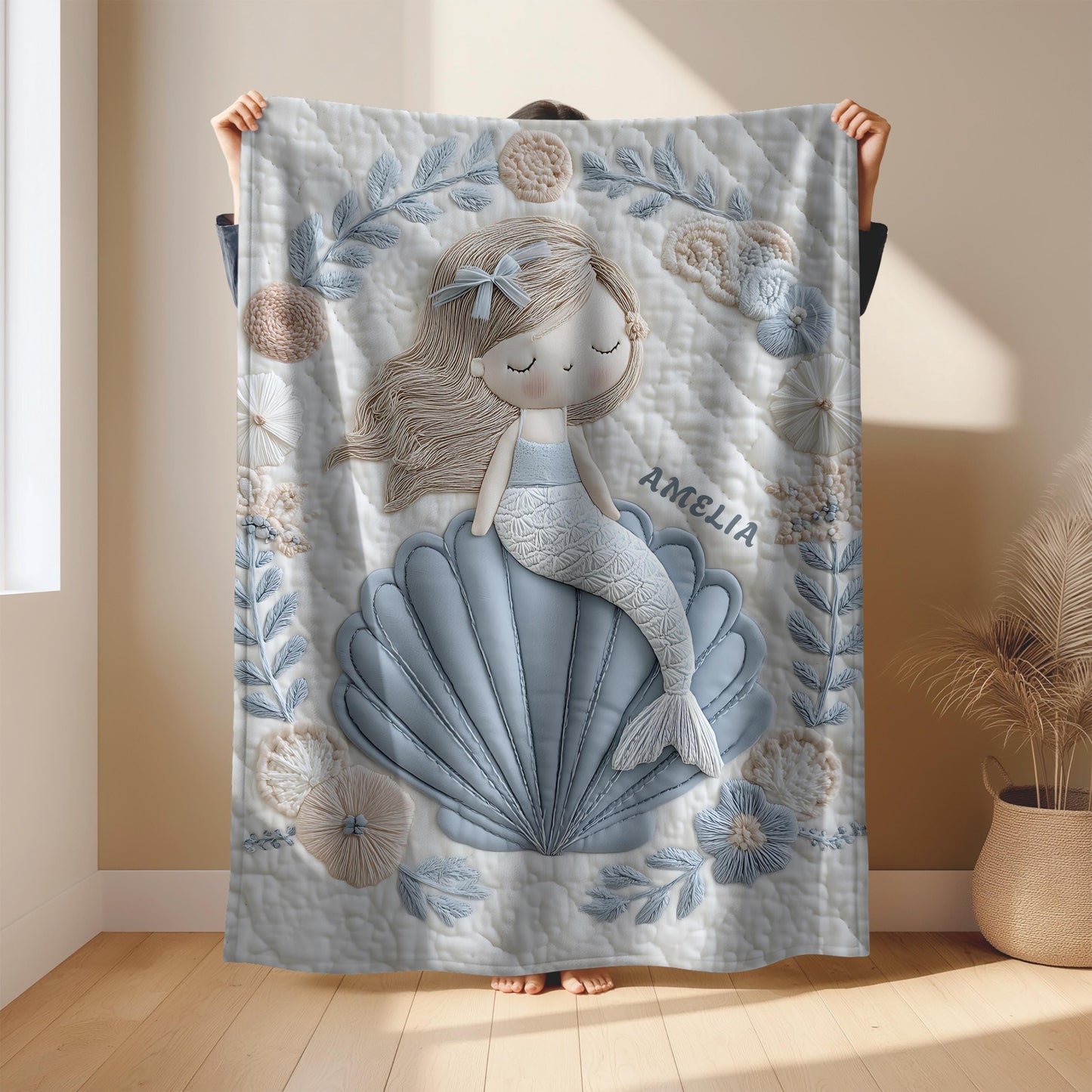 Soft embroidered-look mermaid baby blanket with a calm mermaid seashell design and pastel florals. Neutral tones, cozy fabric — a boutique newborn gift for serene, modern nursery decor.