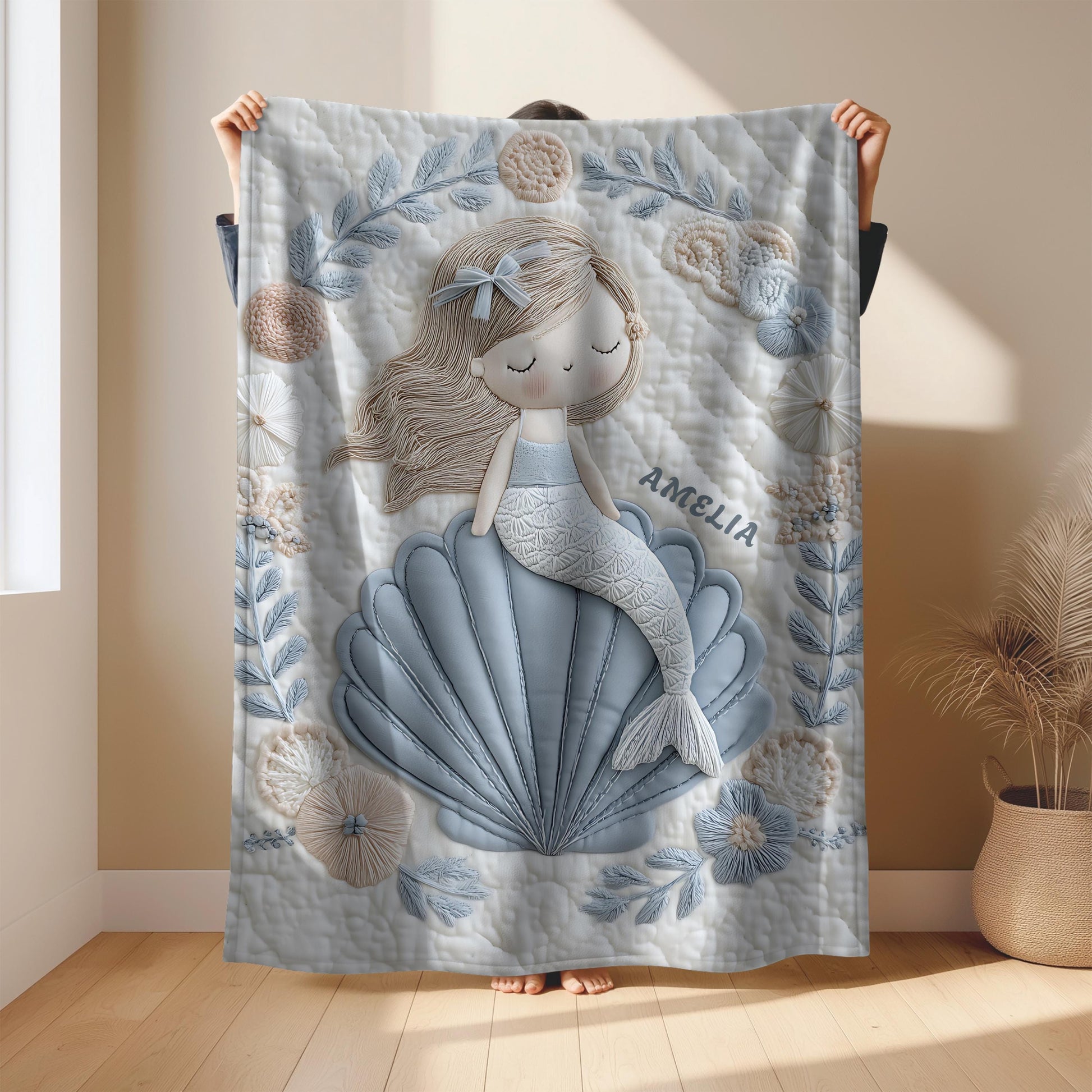 Soft embroidered-look mermaid baby blanket with a calm mermaid seashell design and pastel florals. Neutral tones, cozy fabric — a boutique newborn gift for serene, modern nursery decor.