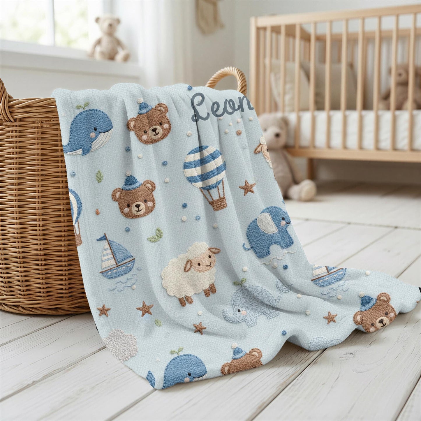 Personalized baby blanket with name in embroidery look. Sweet animals, hot air balloon & boat in calm earth tones – soft velveteen for nurseries.