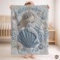 Soft embroidered-look mermaid baby blanket with a calm mermaid seashell design and pastel florals. Neutral tones, cozy fabric — a boutique newborn gift for serene, modern nursery decor.