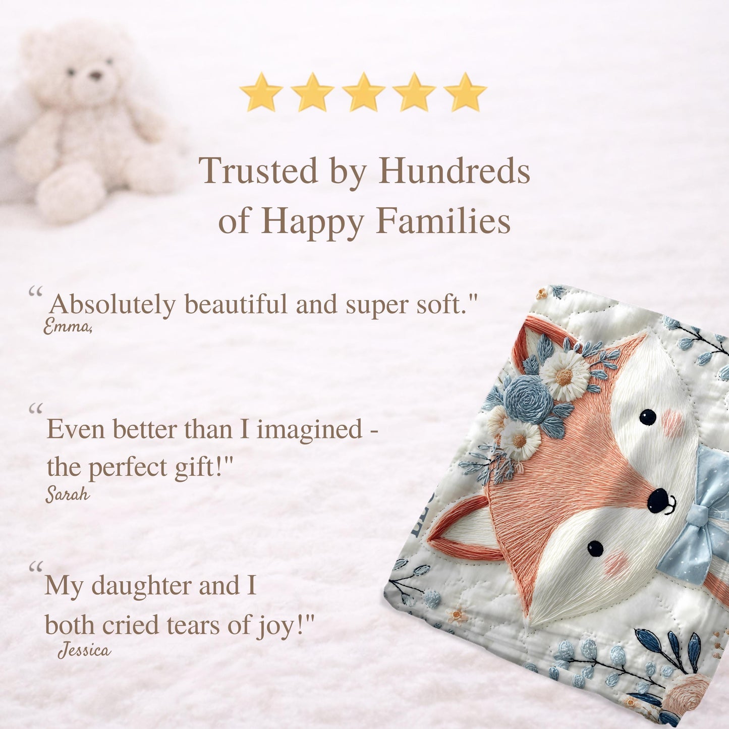Embroidered-look fox baby blanket with soft floral crown and gentle blue–peach stitched details on a neutral background.