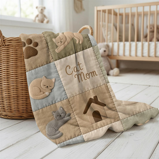 Personalized baby blanket with name in a patchwork look with sweet kitten motifs in neutral tones. Printed quilt style for cozy modern nurseries.