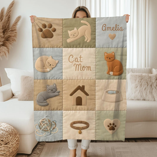 Personalized baby blanket with name in a patchwork look with sweet kitten motifs in neutral tones. Printed quilt style for cozy modern nurseries.
