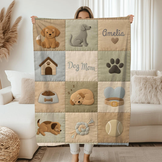 Personalized baby blanket with name in a patchwork look with cute puppy motifs in neutral tones. Printed quilt style for cozy modern nurseries.