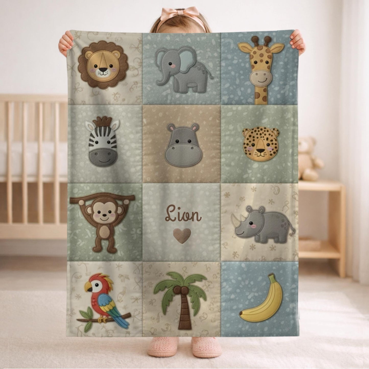 Personalized jungle baby blanket with name in embroidered quilt look. Monkey & parrot design for neutral safari nursery decor and unique baby gift.
