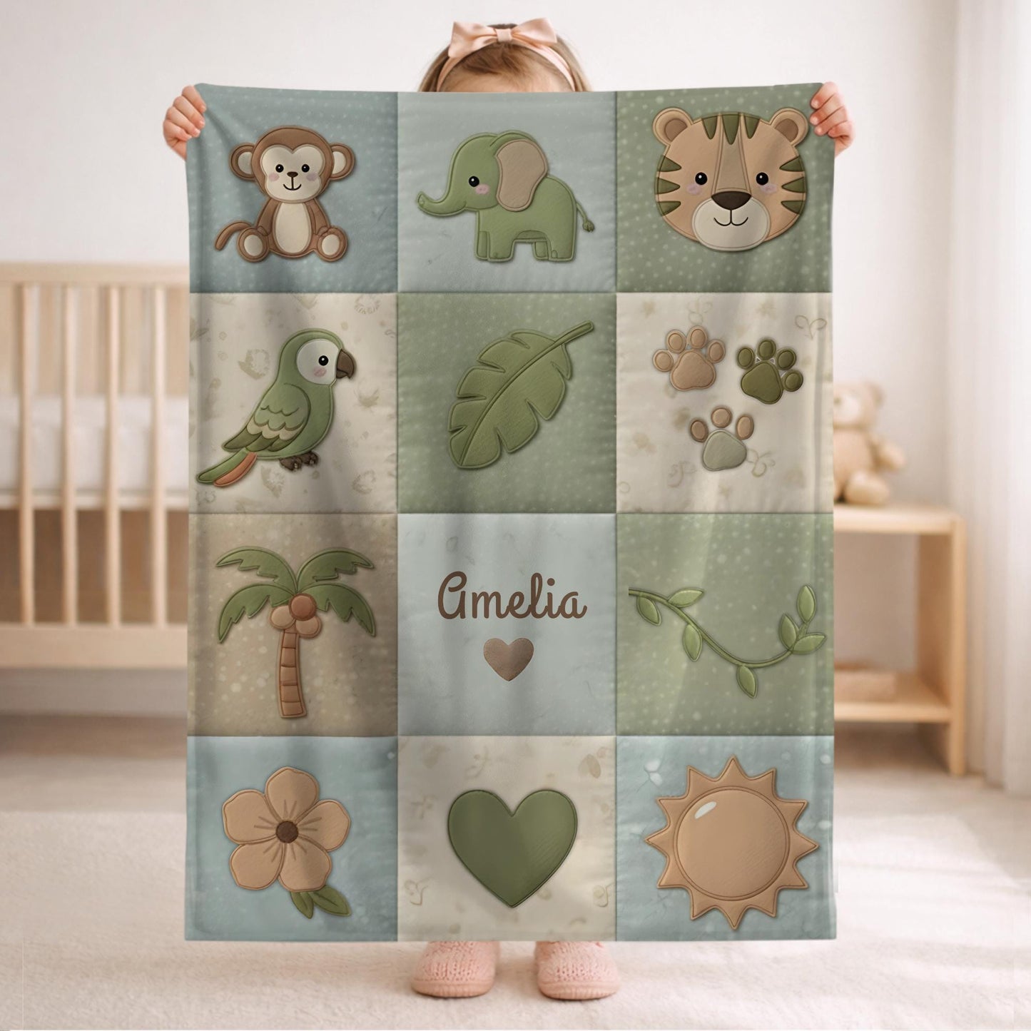 Personalized botanical safari baby blanket with name in embroidered quilt look. Soft greenery design for neutral nursery decor and timeless baby gift.