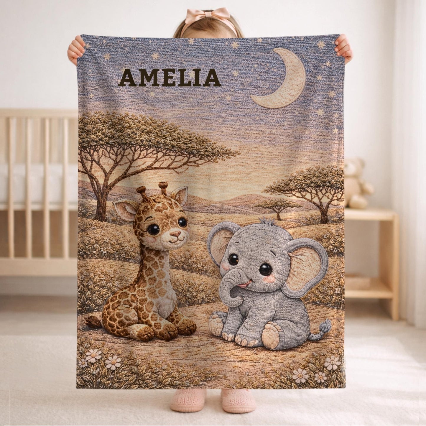 Drift into peaceful dreams beneath the savanna moon. Personalized giraffe and elephant baby blanket in a soft moonlit quilt look embroidery design.