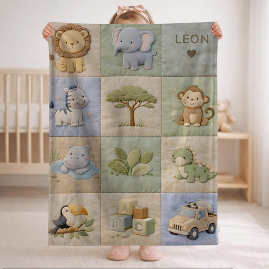 Personalized patchwork look baby blanket with name and sweet safari animals like lion, elephant and monkey in a soft quilt style design.