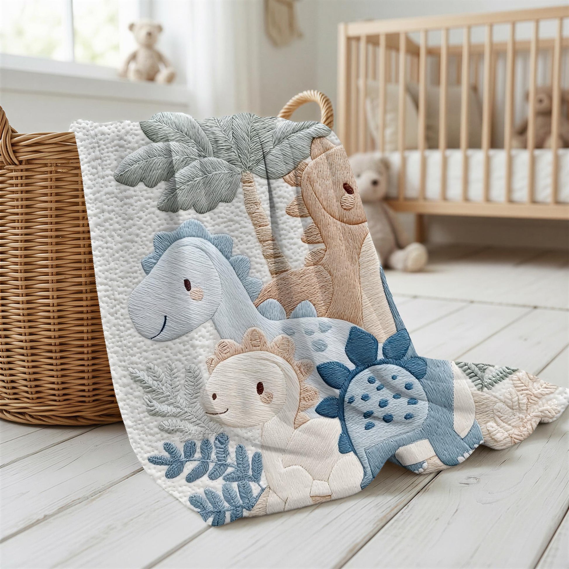 Personalized Dinosaur baby blanket with name - embroidered look details in soft neutral colors. A cozy newborn blanket and timeless boutique baby gift.