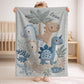 Personalized Dinosaur baby blanket with name - embroidered look details in soft neutral colors. A cozy newborn blanket and timeless boutique baby gift.