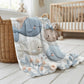 Soft embroidered-look baby blanket featuring a calm fish motif with delicate floral details. Gentle neutral and pastel tones — a timeless boutique-style gift for modern, serene nurseries.