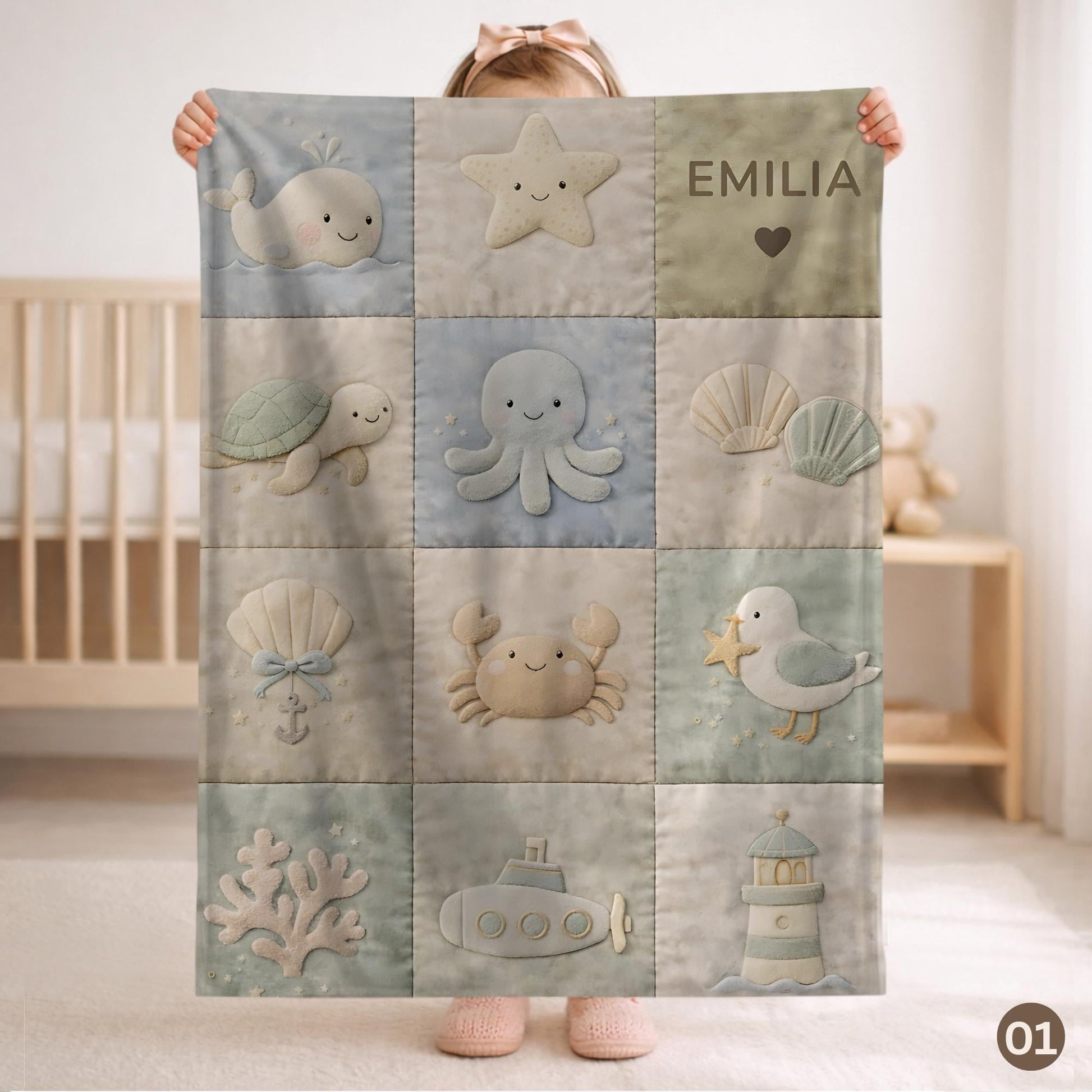 Personalized patchwork look baby blanket with name, crab, whale and octopus in a soft underwater quilt design. Cozy newborn blanket and baby gift.