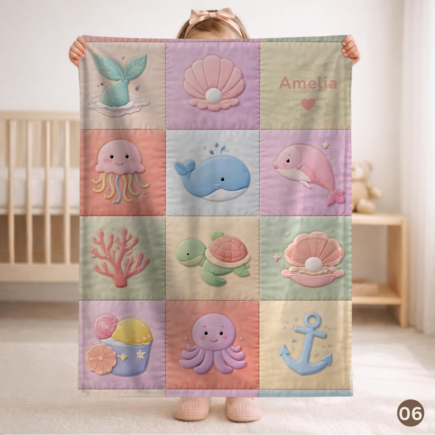 Personalized patchwork look baby blanket with name, crab, whale and octopus in a soft underwater quilt design. Cozy newborn blanket and baby gift.