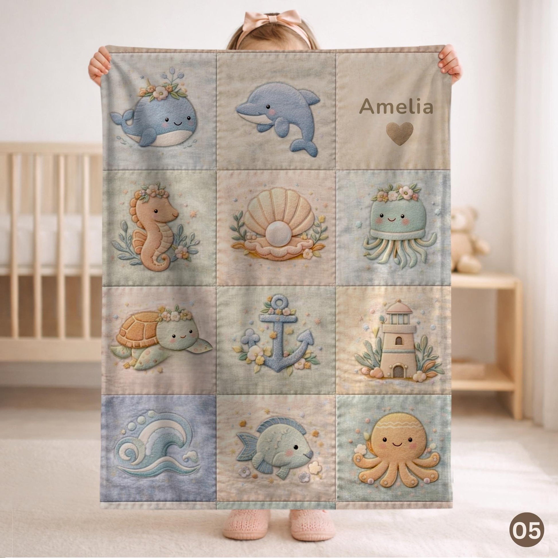 Personalized patchwork look baby blanket with name, crab, whale and octopus in a soft underwater quilt design. Cozy newborn blanket and baby gift.
