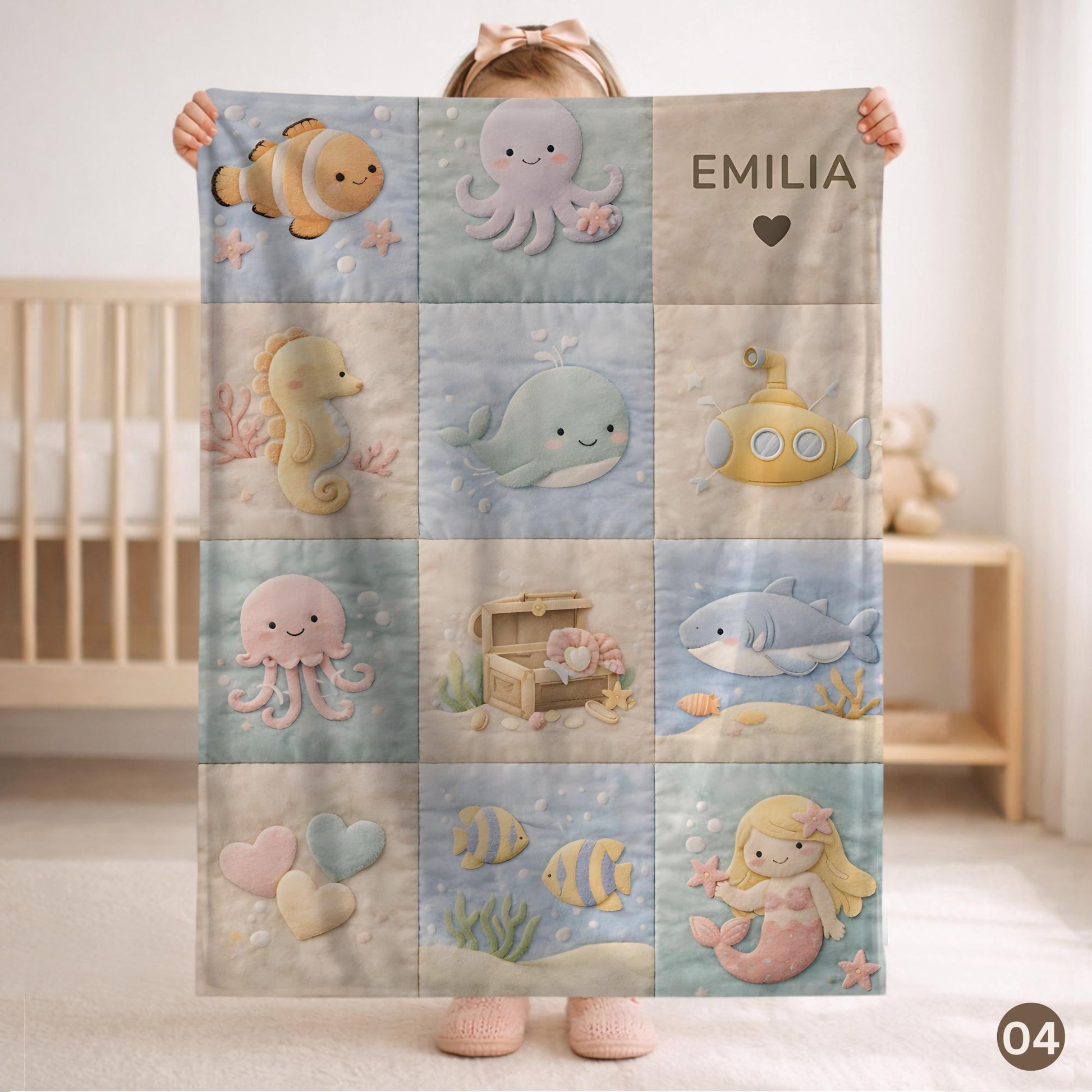 Personalized patchwork look baby blanket with name, crab, whale and octopus in a soft underwater quilt design. Cozy newborn blanket and baby gift.
