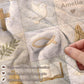 Christian patchwork look baby blanket with faith symbols in a soft quilt-style design. Neutral tones, optional name, perfect baptism gift.