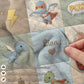 Superhero dinosaur baby blanket with name in playful action theme. Personalized dino hero design for fun nursery decor and unique baby gifts.