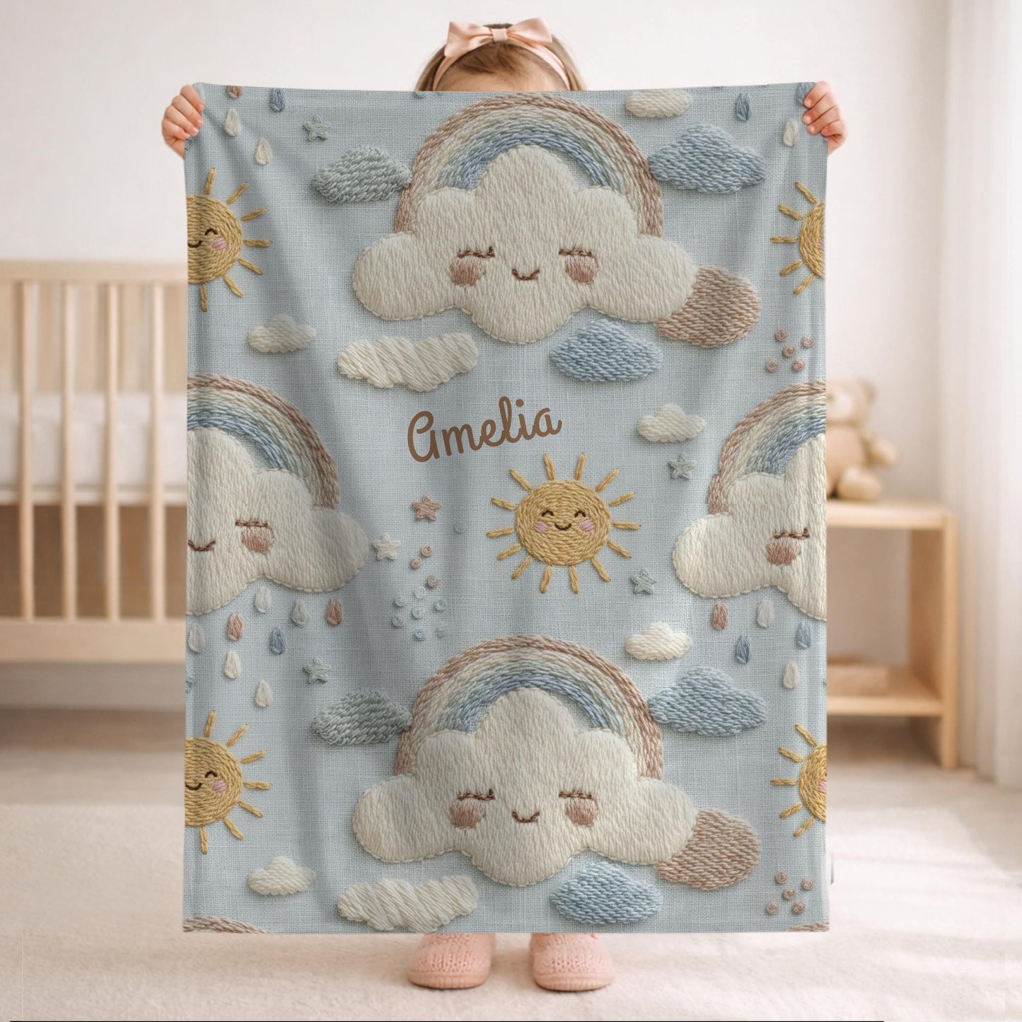 Personalized baby blanket in stitched look with dreamy clouds and rainbow. Soft neutral nursery decor and unique baby shower gift.