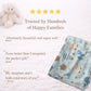 Personalized baby blanket with name in embroidery look. Sweet animals, hot air balloon & boat in calm earth tones – soft velveteen for nurseries.
