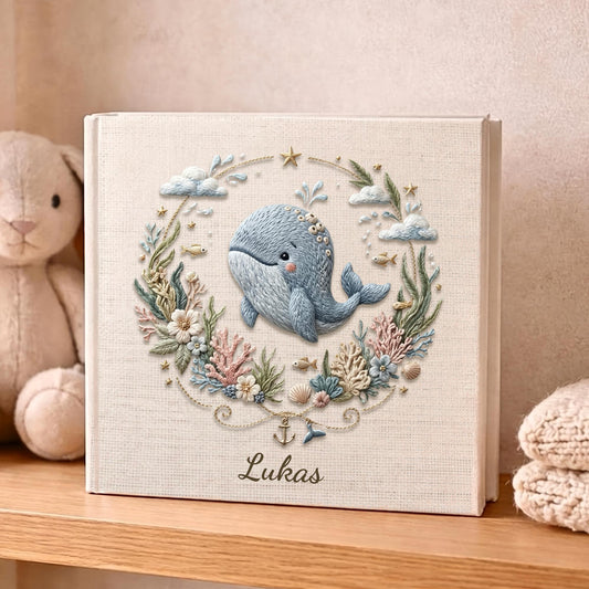 Personalized ocean themed whale baby album 8x8 with custom name. A calm nautical nursery memory book and timeless newborn keepsake.