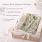 Garden baby blanket in embroidered quilt look. Butterfly and bee botanical design for neutral nursery decor and baby gift.