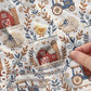 Embroidery Look farm baby blanket in embroidered quilt look. Tractor, barn and sheep design for neutral nursery decor and baby gift.