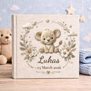 Personalized safari lion baby album with custom name and date. A warm jungle nursery memory book and newborn keepsake.