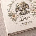 Personalized bunny baby album with floral crown and custom name. A soft neutral nursery memory book and timeless newborn keepsake.