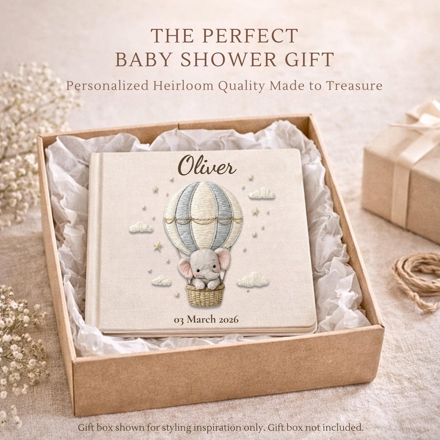 Personalized elephant baby memory album with hot air balloon design, custom name and optional birth date. A neutral nursery keepsake and timeless newborn photo book.